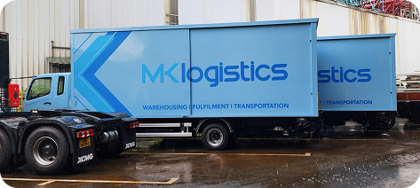 MK Logistics trucks at the loading bay